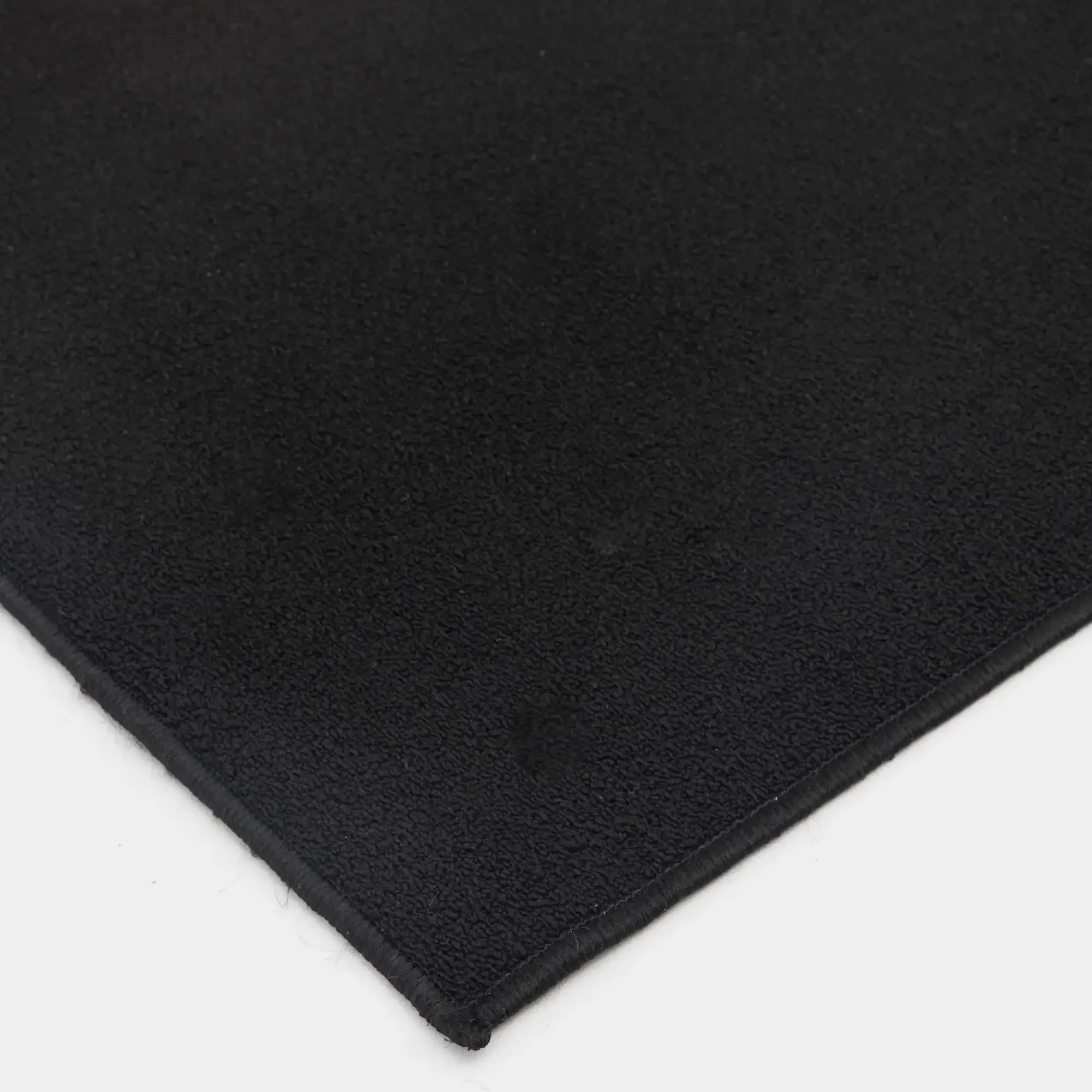 

54x78 Inch Titan Solid Black Area Rug, Durable Indoor Carpet for Living Room & Bedroom, Non-Slip Low Pile Home Rug