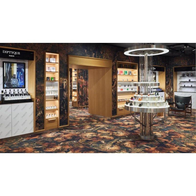 custom.Custom Luxury Perfume Gold Accented LED Lit Display Counters High-End Retail Interior Design Build Sho