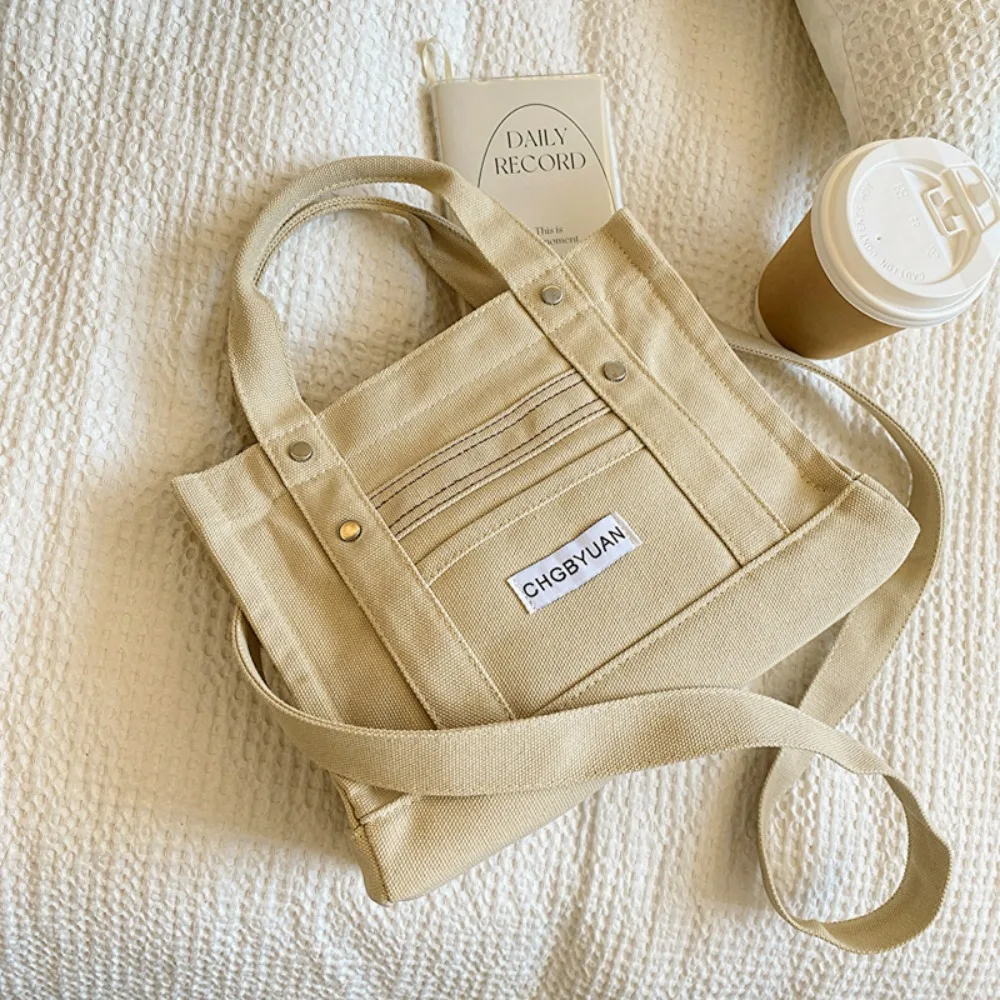 

Casual Large Capacity Canvas Bag Handbag Printed Shoulder Bag Commute Simple Letter Tote Bag Unisex