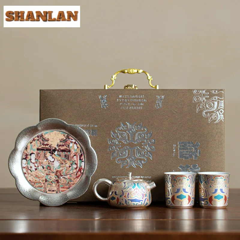 

Dunhuang Gilt Silver Teapot Set Creative Ceramic Tea Set Kit With Pot Holder Ancient Tea Ceremony Set 1 Pot 2 Cups Set Teaware