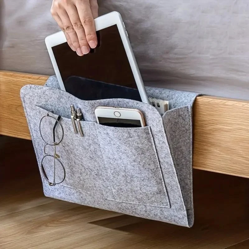

Bedside hanging storage bag Mobile phone remote control tissue storage bag Bedside book storage hanging bag household items