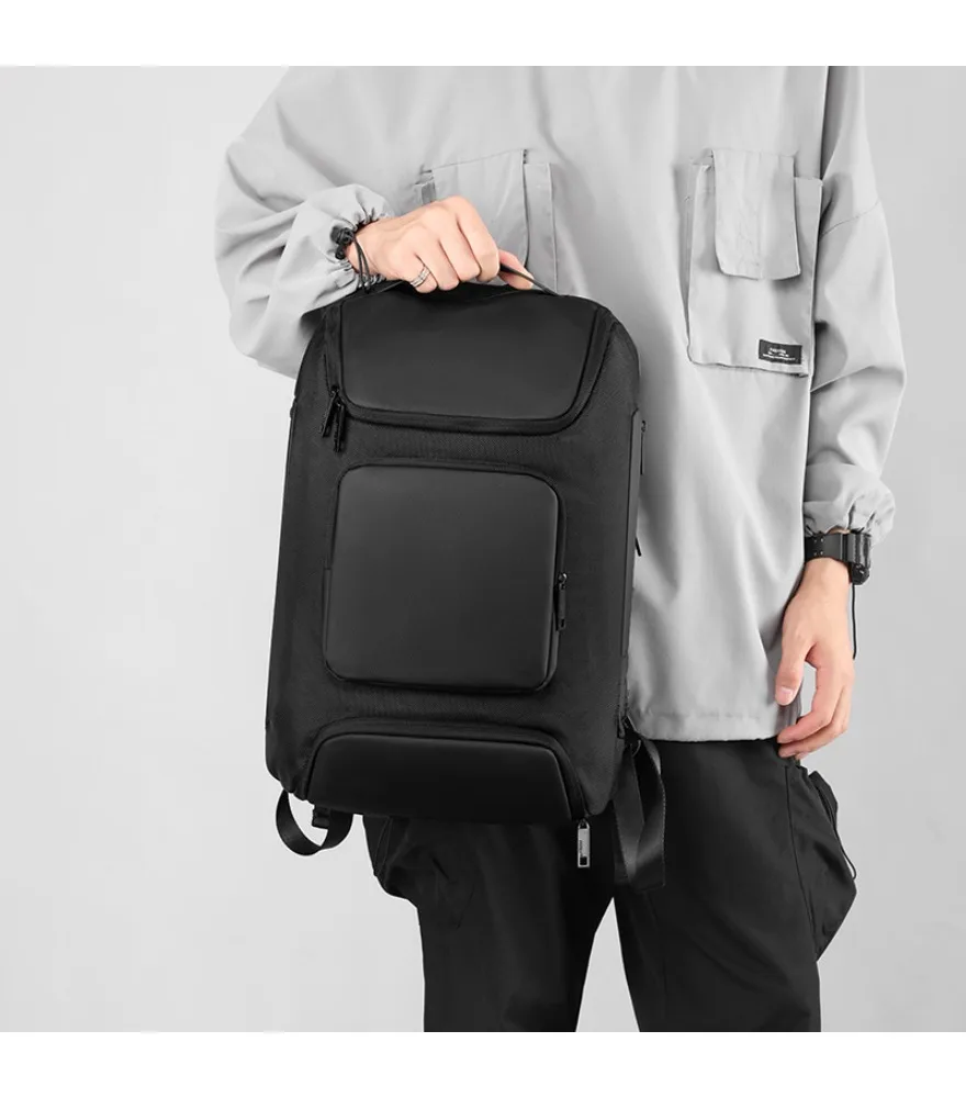

Black dual front pocket backpack with outer USB charging port anti splash scratch resistant fabric for all occasion daily use