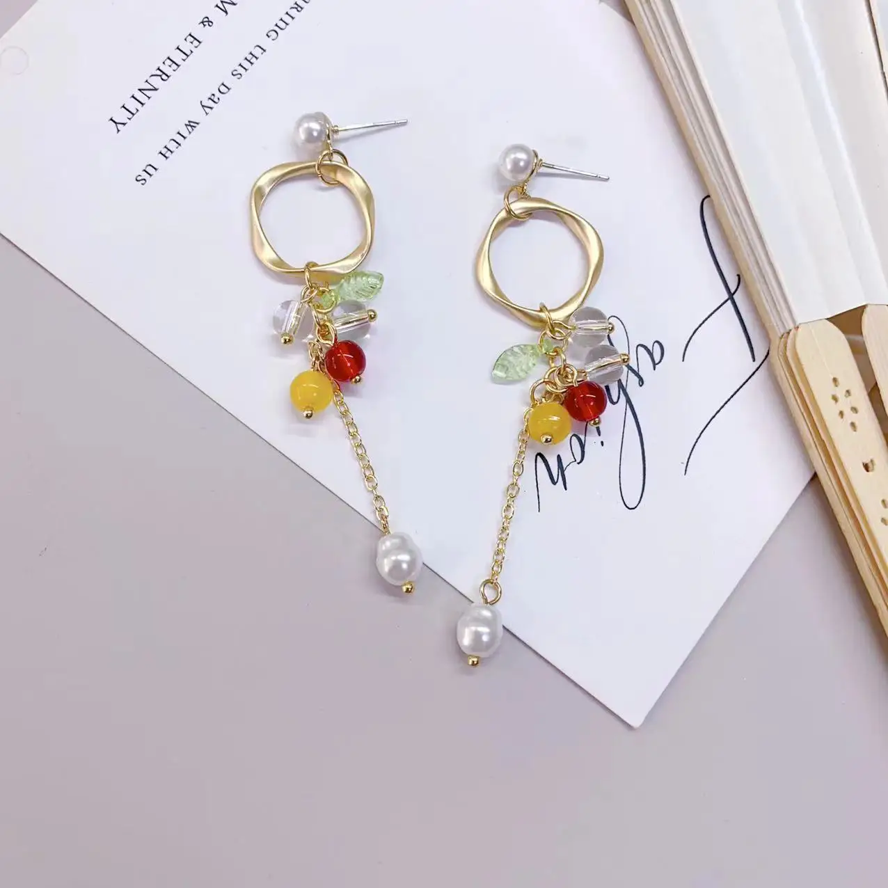 

Small fresh colored bead long tassel earrings with high-end and niche design, antique pearl earrings