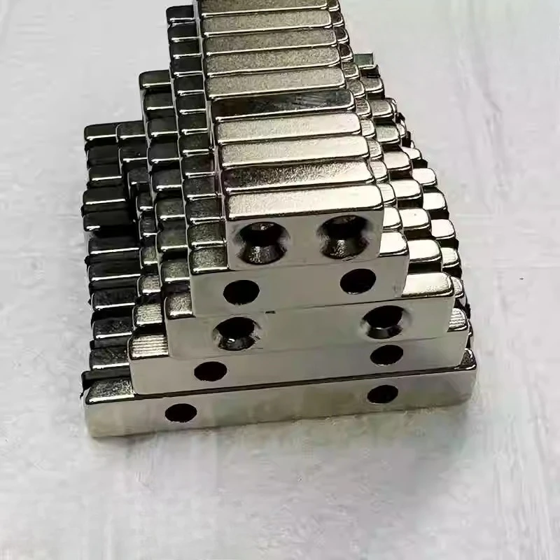50pcs/lot  Rectangular double-hole powerful magnets, diameter 20–40 millimetres