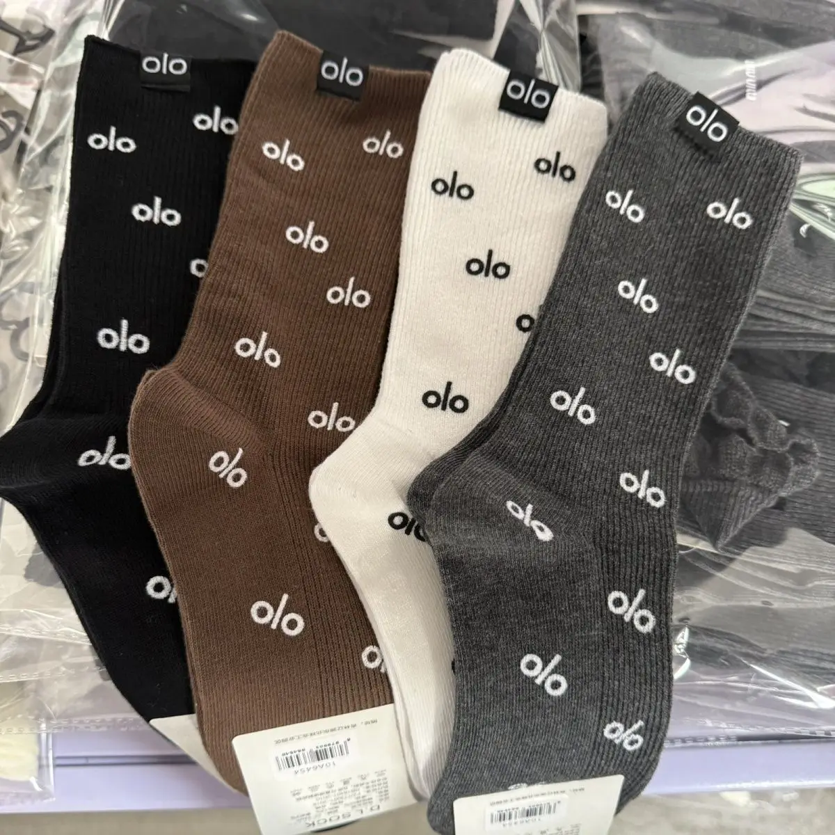 

2026 light luxury olo letter mid tube men's and women's socks, pure cotton anti odor socks, versatile Y2K printed fashionable so