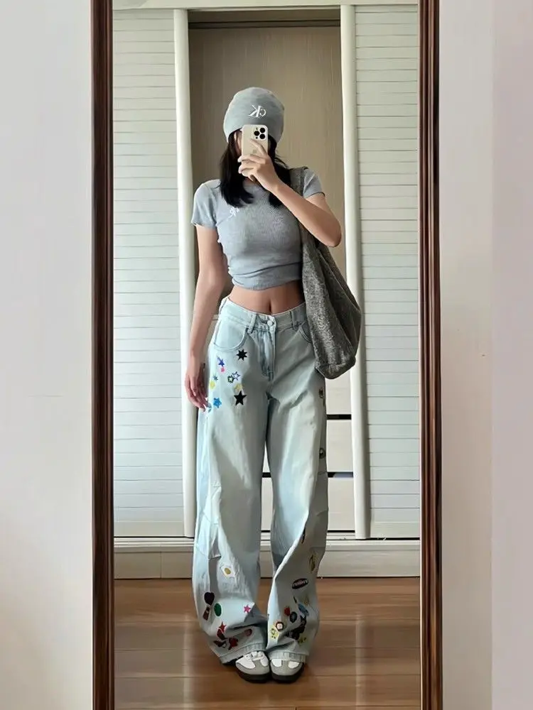 กางเกงยีนส์ทรงหลวมพิมพ์ลายการ์ตูนสีน้ำเงินวินเทจ สไตล์ Y2K สำหรับผู้หญิง ฤดูใบไม้ร่วง 2025 สไตล์ฮาราจูกุ ขากว้าง เอวสูงทรงโอเวอร์ไซส์ ยุค 2000