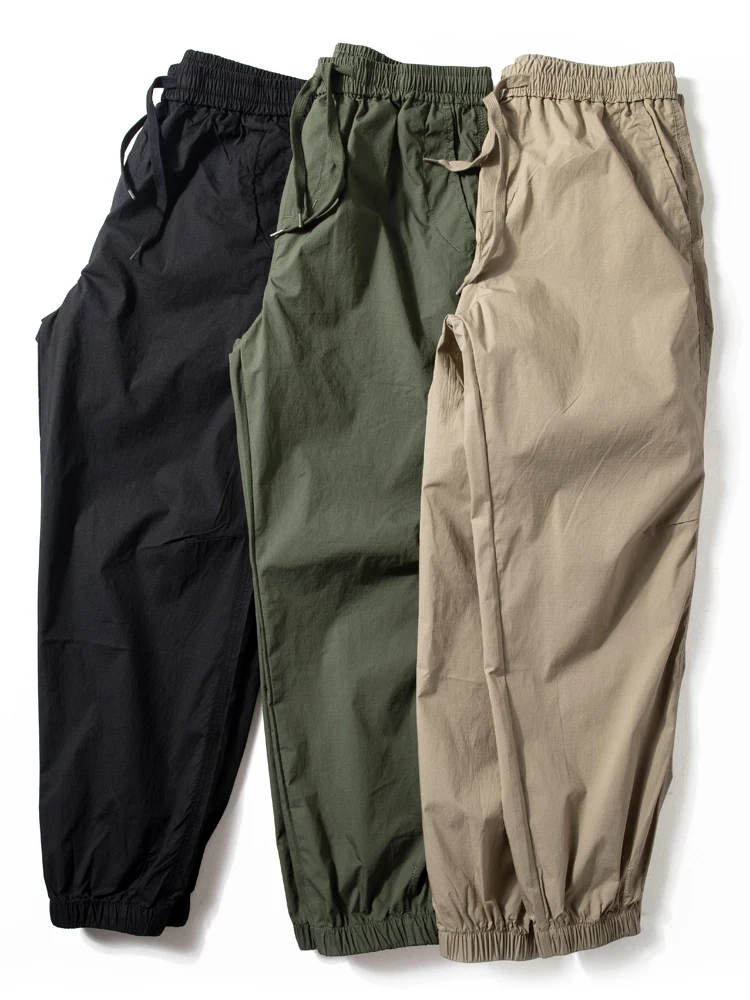 

Qui Dry Ice Silk Базовые мужские уличные брюки с девятью точками спецодежды Свободный крой Удобные молодежные брюки из полиэфирного волокна