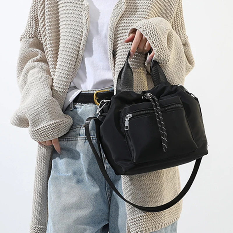 Nuove borse a secchiello con cordino in Nylon borsa a tracolla morbida con coulisse in stile coreano borsa a tracolla Casual di grande capacità borsa da donna di moda