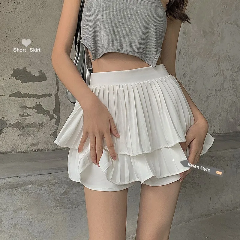 กระโปรงพลีทสองชั้นเอวสูง รุ่นใหม่สำหรับฤดูร้อน สไตล์หวานซ่อนเปรี้ยว ไซส์เล็ก สีขาว ทรงเอ หรือทรงเค้ก