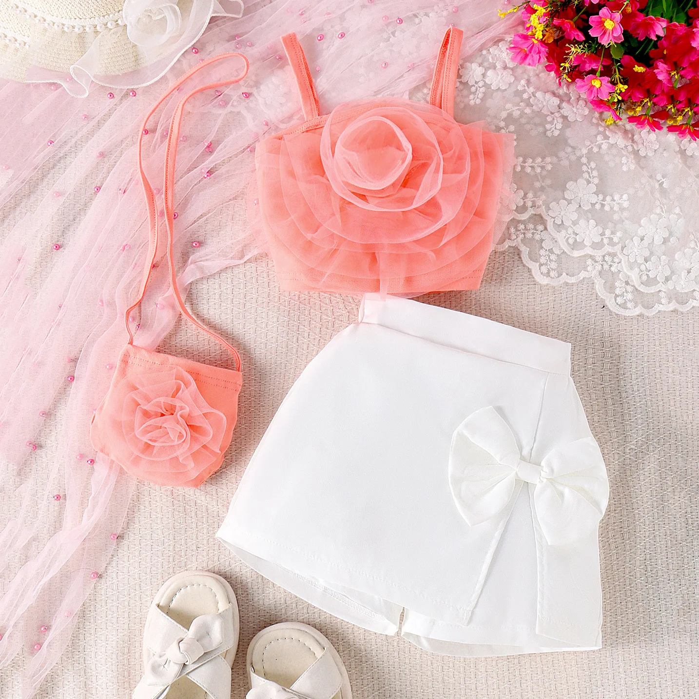 

Fashionable Children Suit Girl Three-piece Set Summer Flower Suspender Top Irregular with Bow Short Bag Kid Outfit Casual Wear