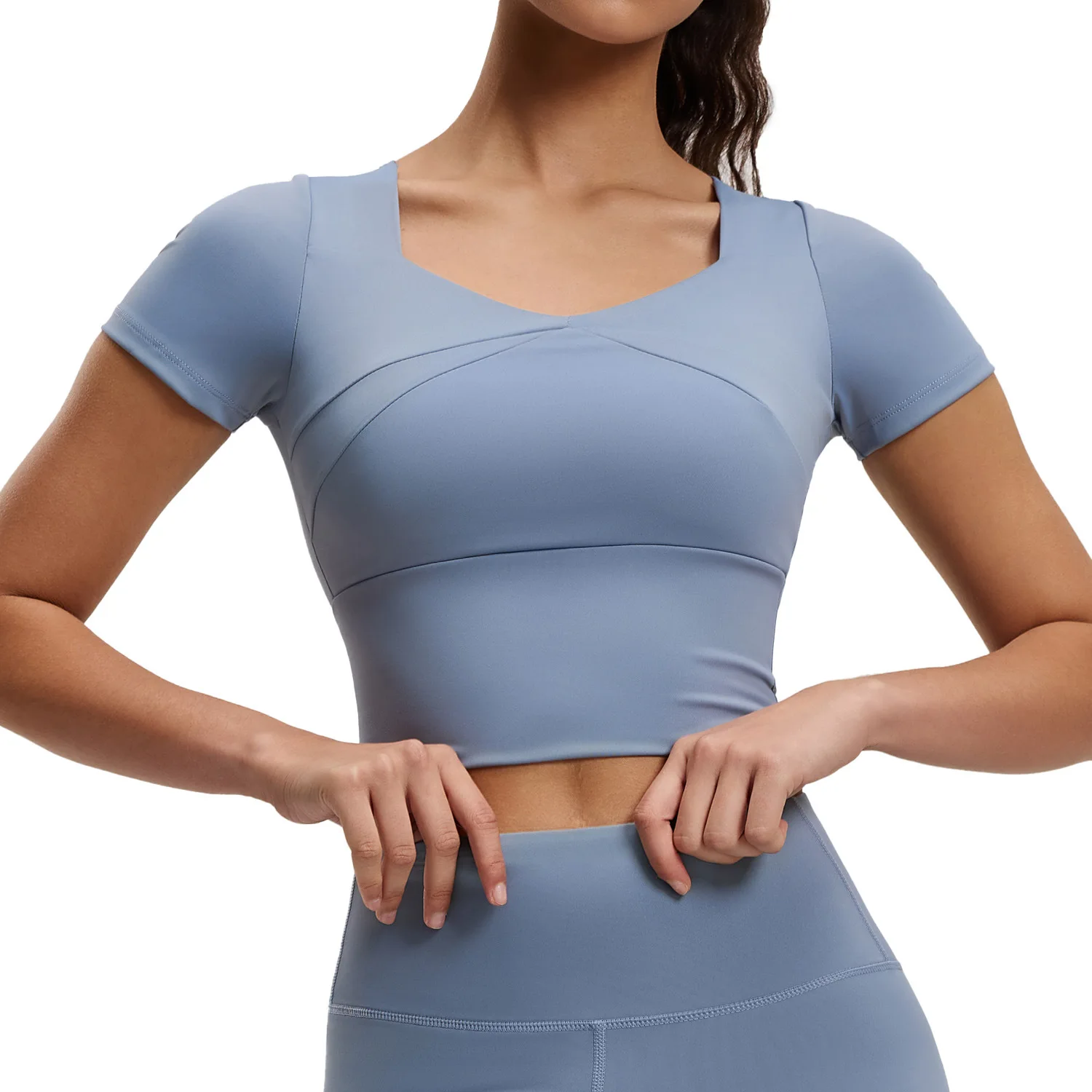 Yoga top with elastic waistband and padded chest for fitness and exercise, a nude yoga short sleeve.