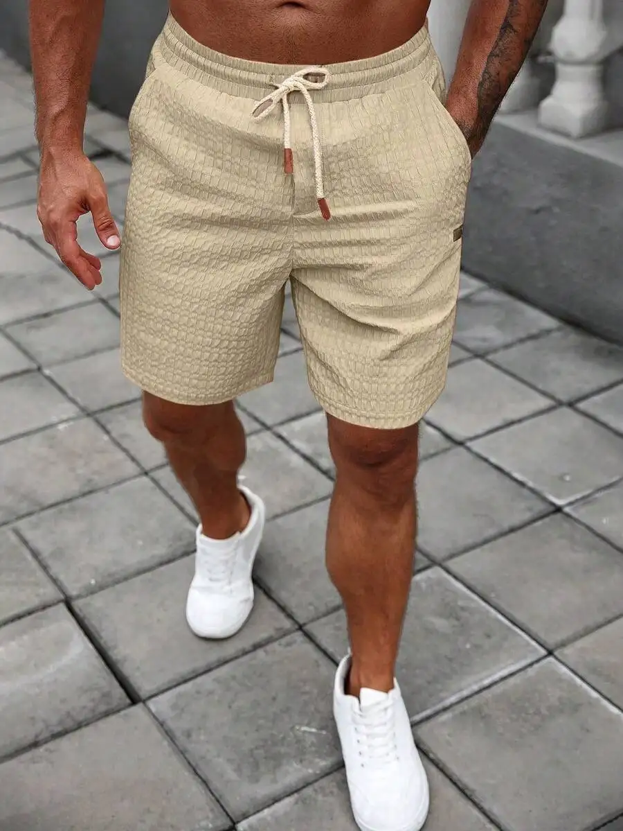 Beige Textured Mens Casual Shorts With Adjustable Drawstring Waist And Functional Side Pockets