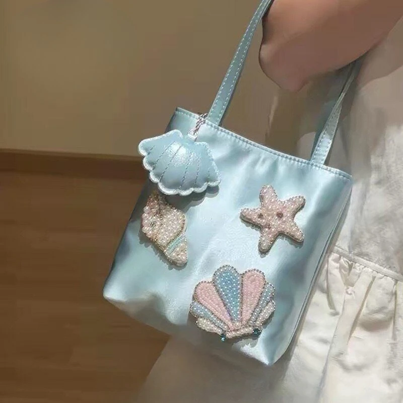 

Original Sea Breeze Satin Bag Bead Embroidery Handmade Handbag Premium Light Luxury Holiday Handbag High Quality and High Value