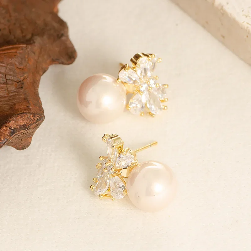 

Korean version of simple and non-fading three-dimensional zirconium bow pearl earrings