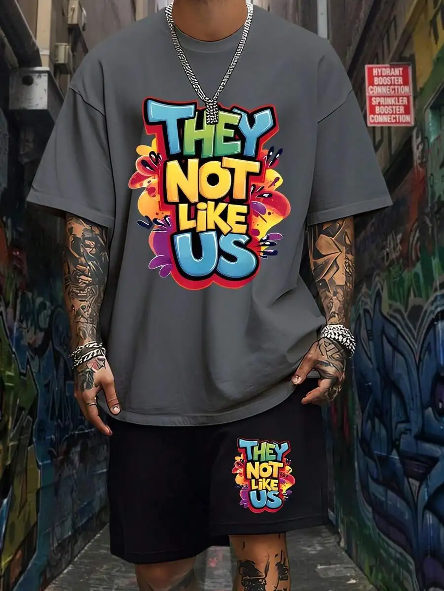 

Mens Graphic T-Shirt And Shorts Set - They Not Like Us Colorful Splatter Print Streetwear