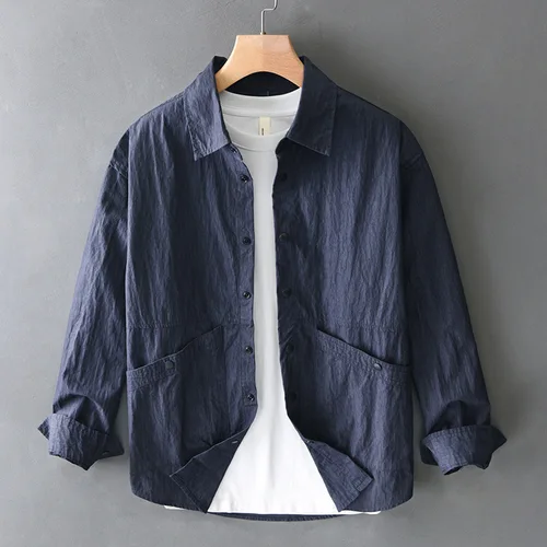 Imagen 1 del producto Camisa plisada de manga larga de color sólido de estilo retro para hombres camisa holgada informal con solapa abrigo