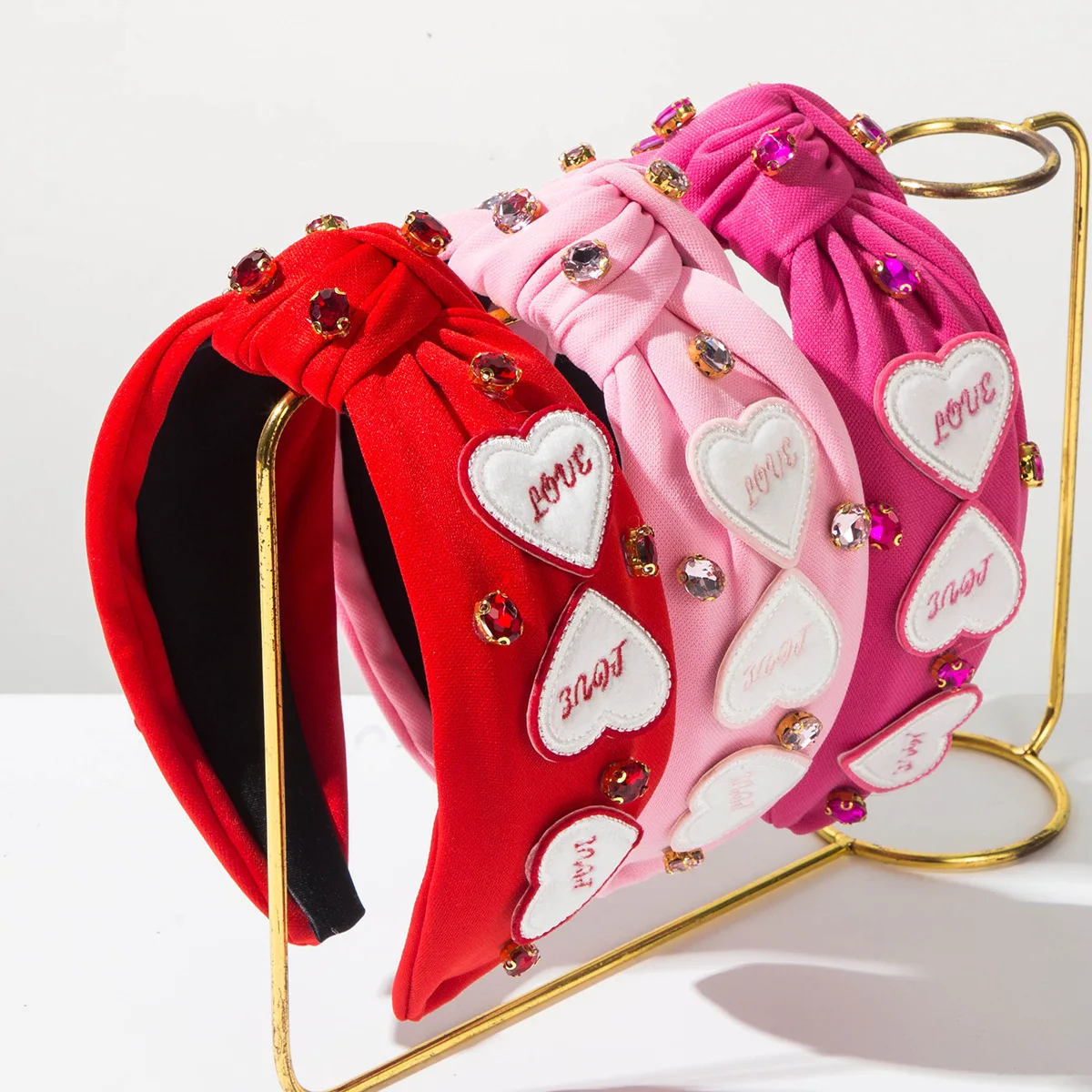 

Heming hot-selling Valentine's Day headband women's simple, sweet and fashionable diamond-encrusted fabric wide-edge letter-knot