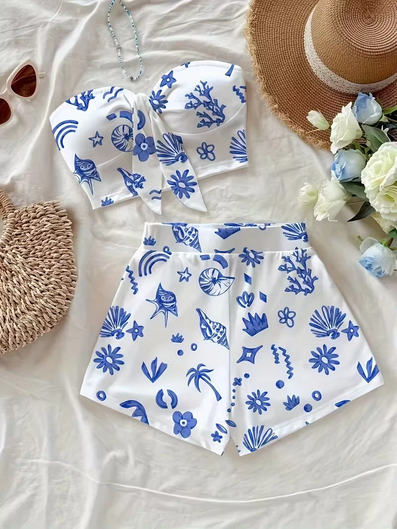 Damski letni zestaw dwuczęściowy: top z efektem skręcenia z przodu i szorty, idealny na wakacje na plaży.