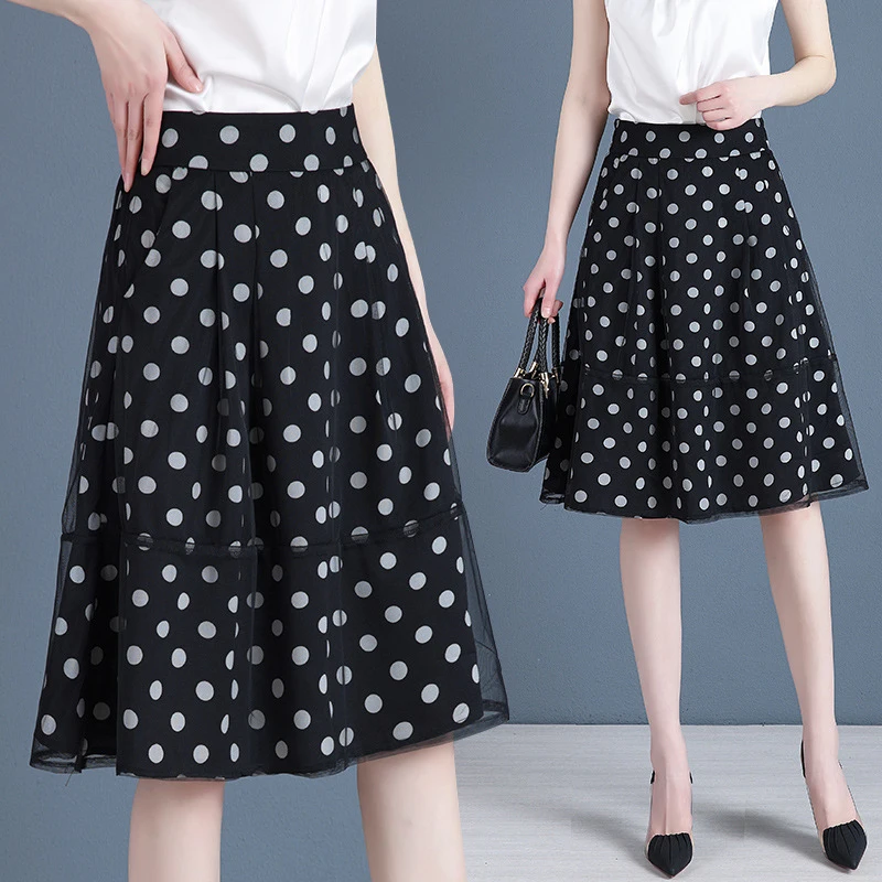 

Женская летняя юбка средней длины из сетки с драпировкой и в горошек. Элегантная шифоновая юбка с высокой талией и прозрачной тканью.