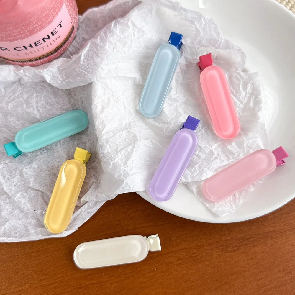 ที่หนีบผมรูปวงรีแฟชั่น2ชิ้น/เซ็ตกิ๊ฟหนีบผมหมวกสีเจลลี่ขนาดเล็กของขวัญคลิปด้านข้างทรงเรขาคณิต