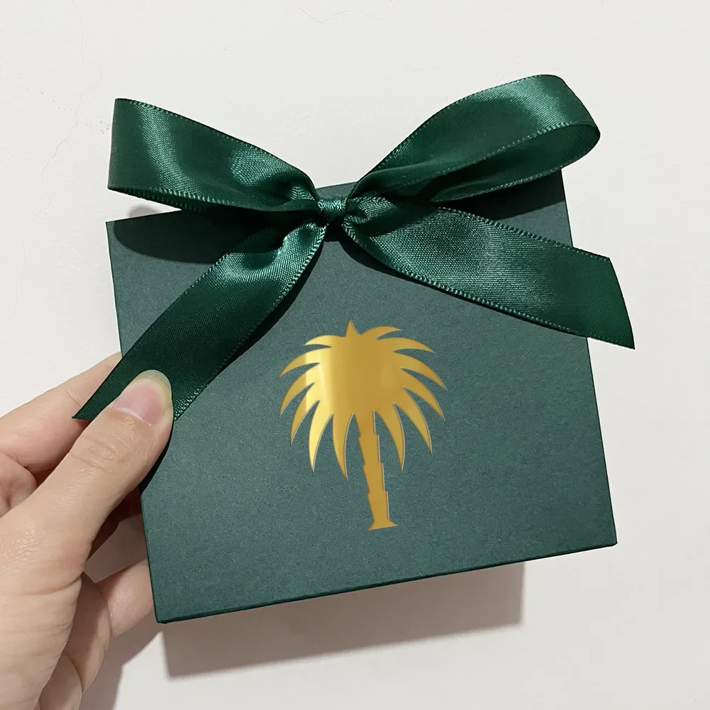 

Elegant Green Gift Bag with Matching Ribbon and Exquisite Palm Tree Candy Box for Small Gifts and Delights
