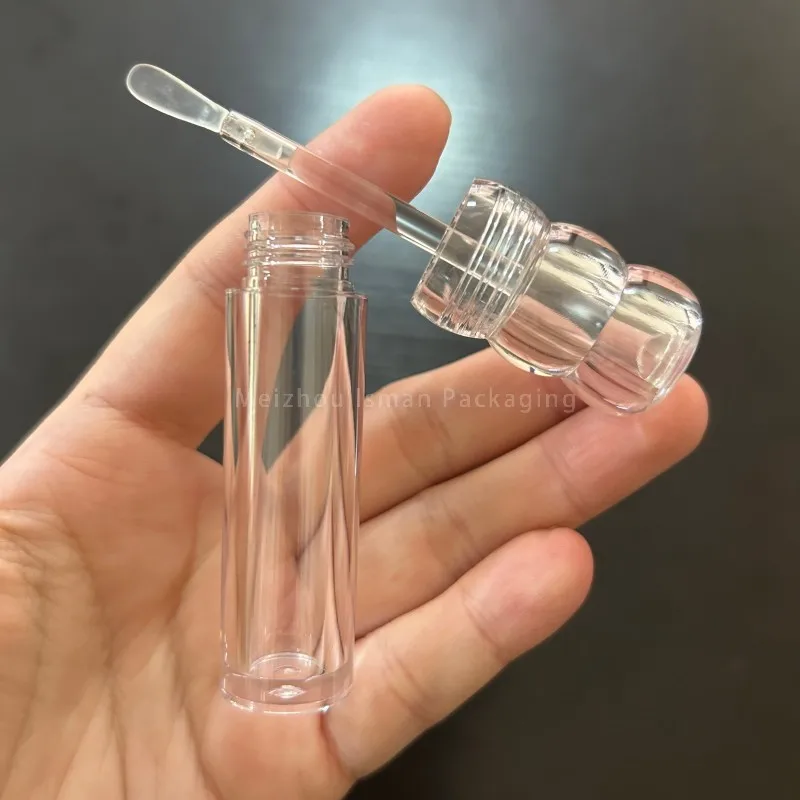 50 szt. Nowe, całkowicie przezroczyste butelki na błyszczyk w kształcie tykwy o pojemności 3 ml, okrągłe opakowania do makijażu, przezroczyste plastikowe tubki na błyszczyk z płaskim pędzelkiem.