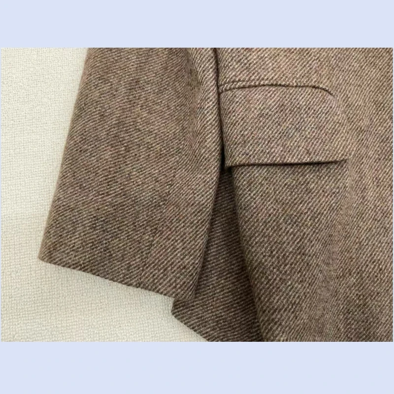 24 سنة الخريف والشتاء النسخة الكورية الجديدة عارضة صديقها نمط متعرجة نمط المرأة فضفاضة الصوف دعوى سترة