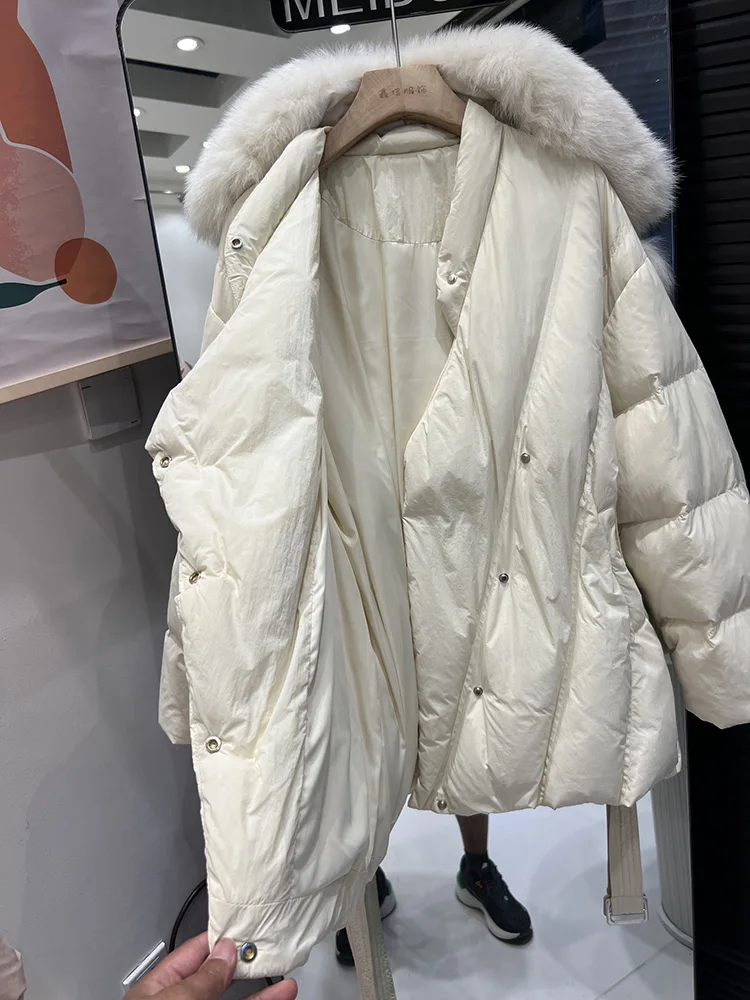 2025 invierno nuevas mujeres de medio a largo de moda cuello de piel de zorro cintura ceñida adelgazante chaqueta de plumón de pato blanco de moda