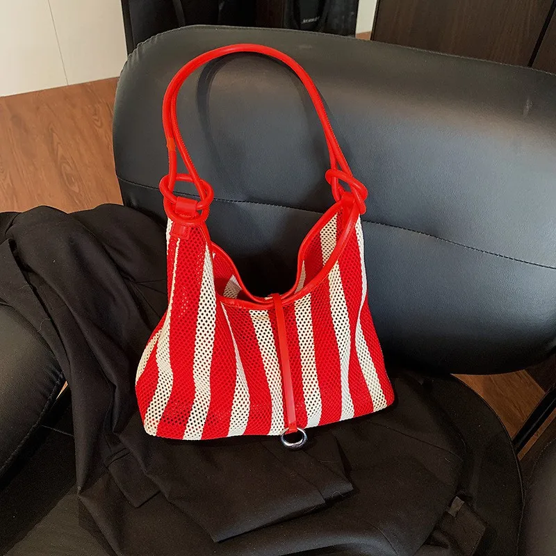 2026-summer-new-large-capacity-women's-tote-bag-woven-shoulder-commuter-fashion-bag-vacation-style-armpit-bag-hollow-out-design