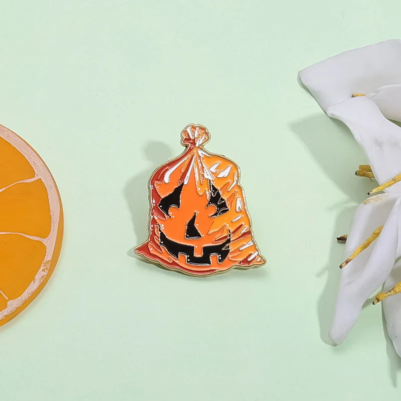 Halloween Pumpkin In Trash Bag Enamel Pin Fashionable men women Brooch Lapel Badge for Backpack Clothing Jewelry Gift