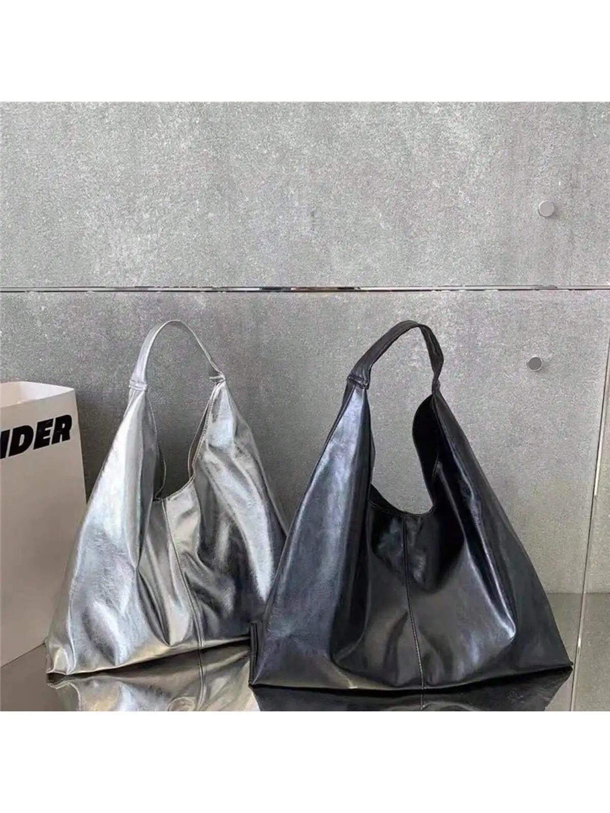 

One large-capacity casual tote bag made of PU leather, a trendy single-shoulder bag with metal accents, perfect for women. It's