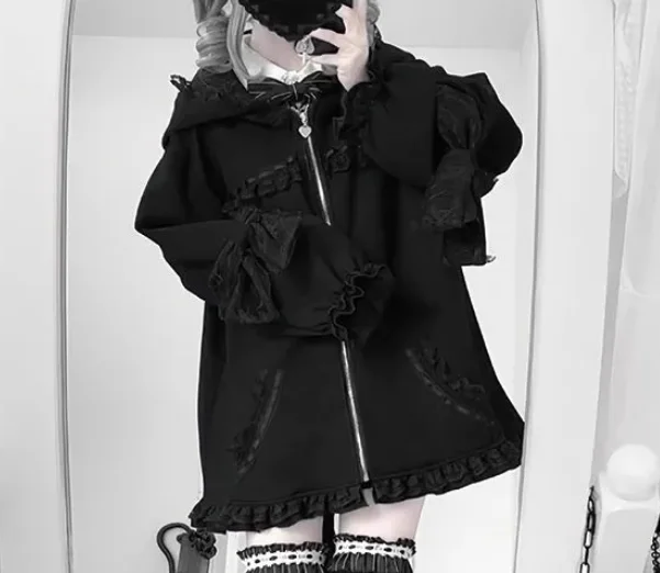 جديد خريف 2025 معطف فضفاض بقلنسوة لطيف ياباني أسود مكشكش بفيونكة حلوة موضة فضفاضة لتخفيض العمر متعددة الاستخدامات بأكمام طويلة