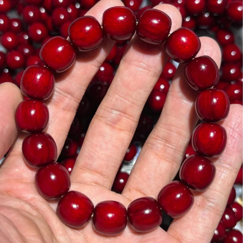 

Blood Dragon Amber Wooden Barrel Bead Single Strand Bracelet, High Oil Content, Jade-like Finish, Fully Transparent, Unisex, Nor