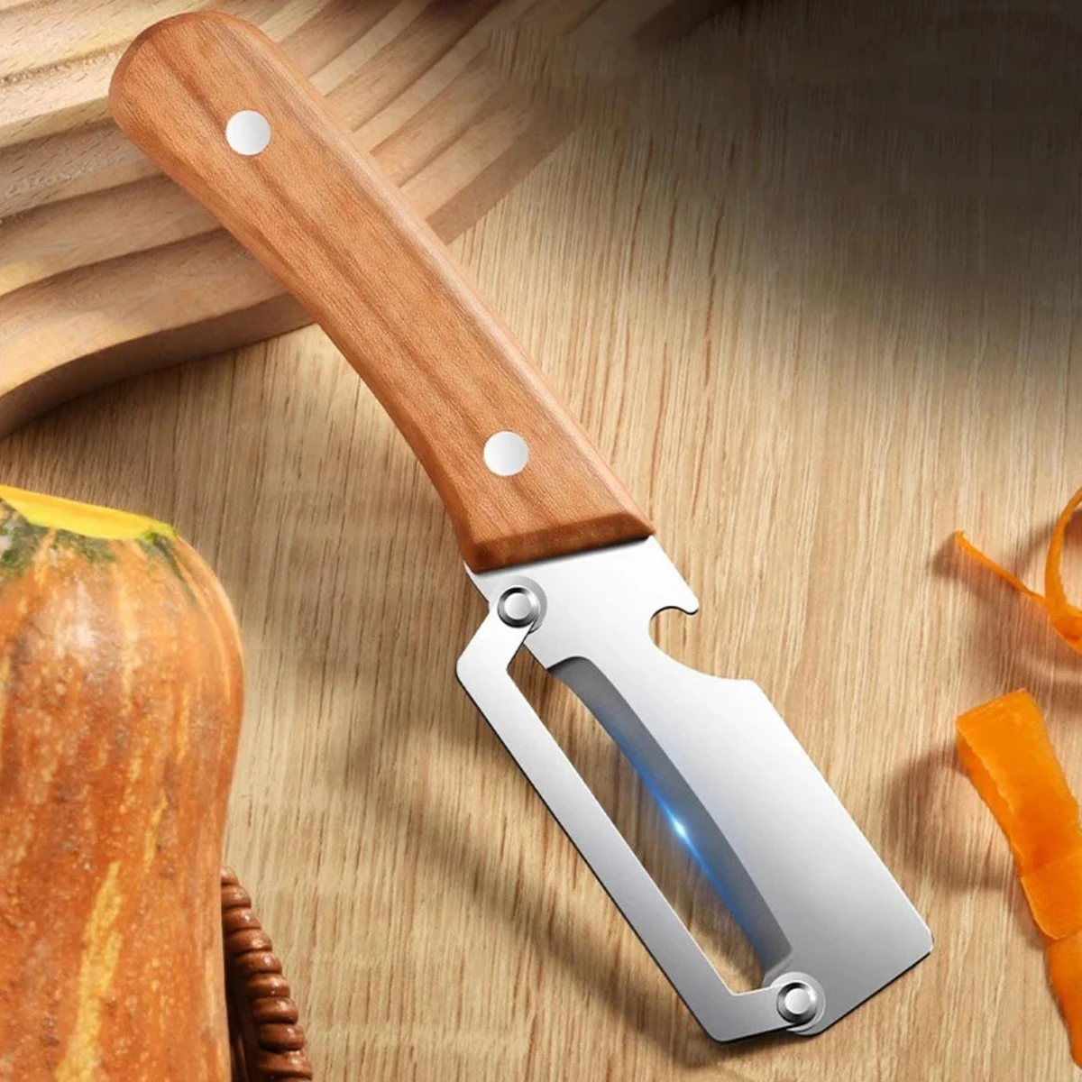 Stainless steel peeler with wooden handle for peeling and slicing fruits and vegetables | Durable and smooth operation