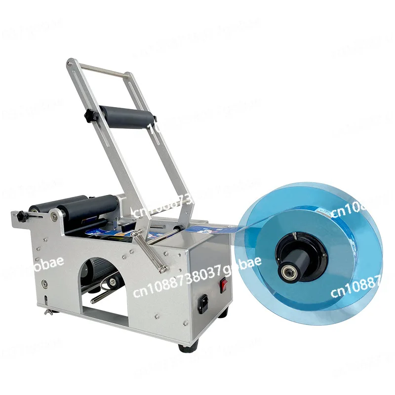 

Semi-automatic round bottle labeling machine MT50 self-adhesive label small hand-held glass bottle manual labeling machine