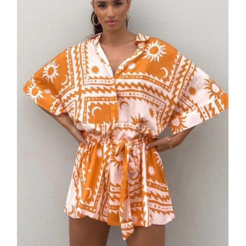 Celana Pendek Satu Potong Wanita Lengan Pendek Motif Musim Panas Adalah Celana Pendek Satu Potong Liburan Wanita Kasual Longgar Bertali Seksi Modis