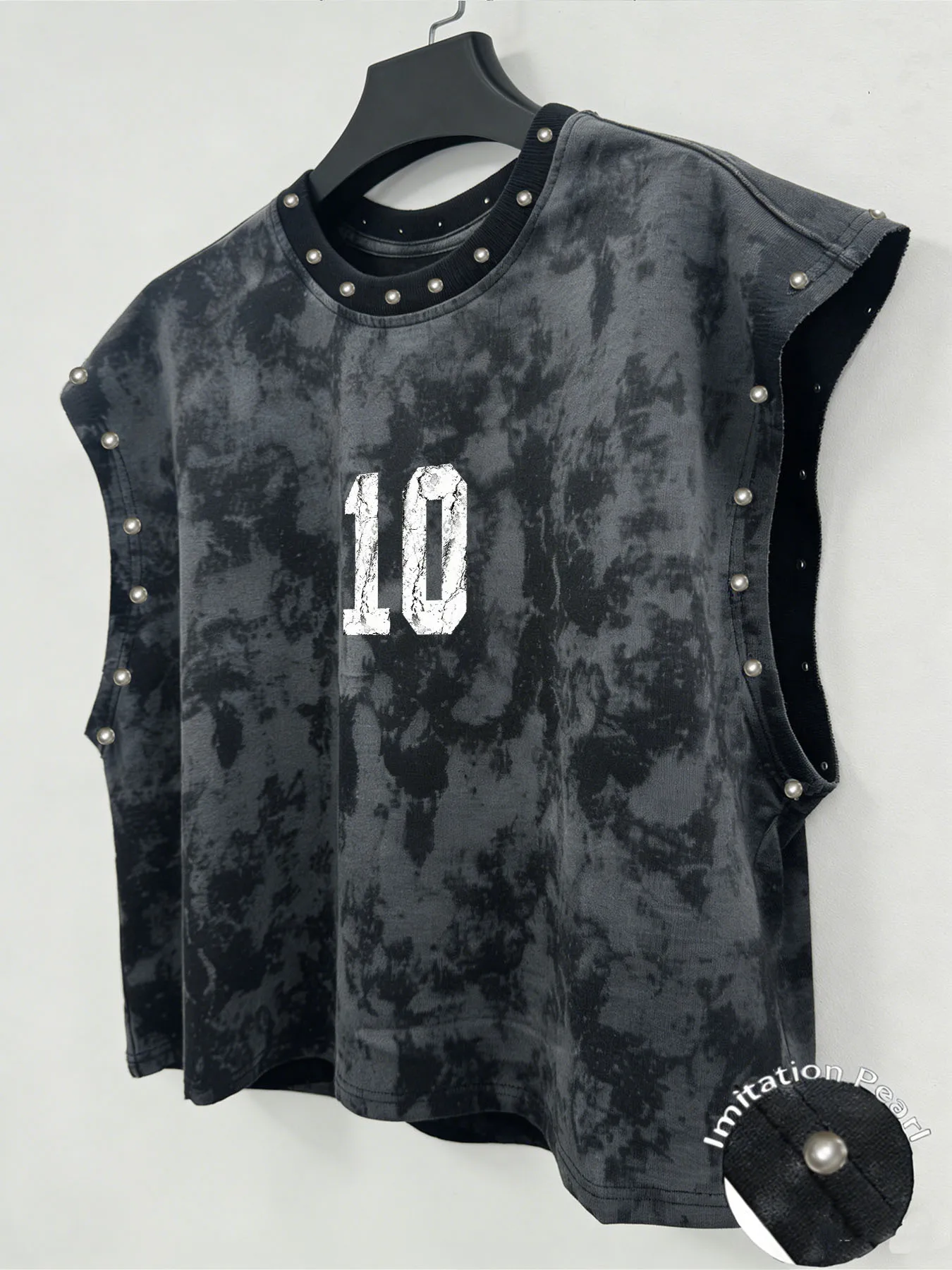 A Unisex, Retro-Style Vest Featuring the Number '10' and Faux-Pearl Accents—Perfect for Music Festivals.