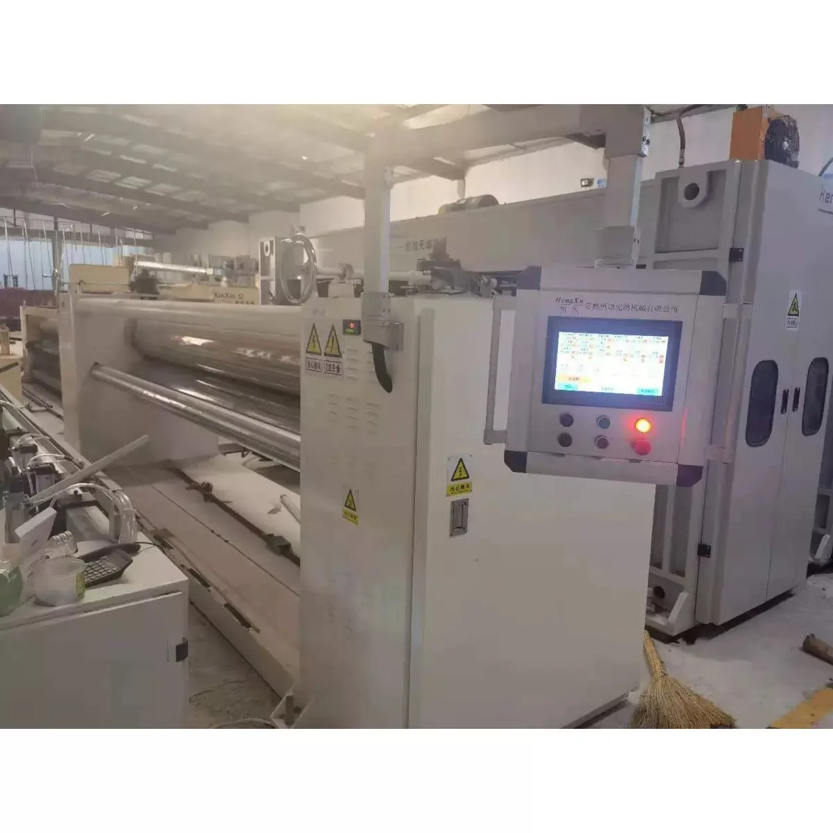 ISO9001 Calandra professionale per macchinari tessili ad alta capacità Attrezzatura da stiro Funzionamento facile Automatico per macchinari non tessuti