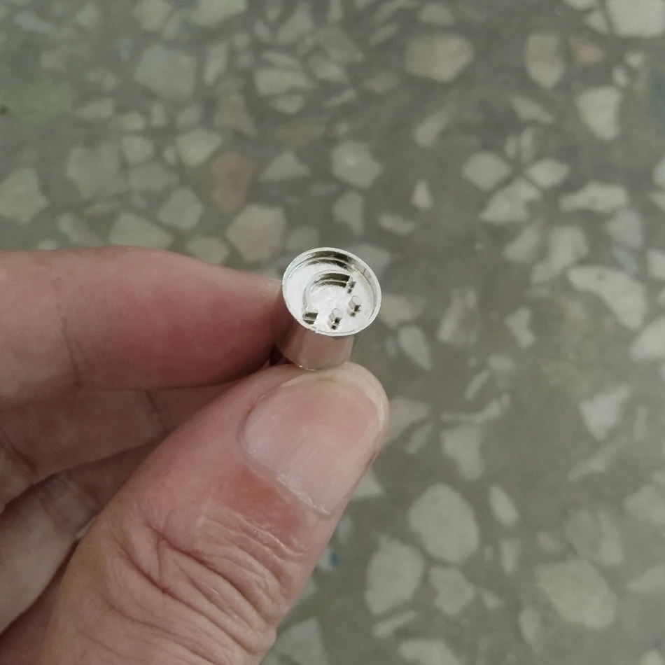 Steel-based precision engraving, leather craftsmanship, metal stamping punches, smile emoticon stamp.