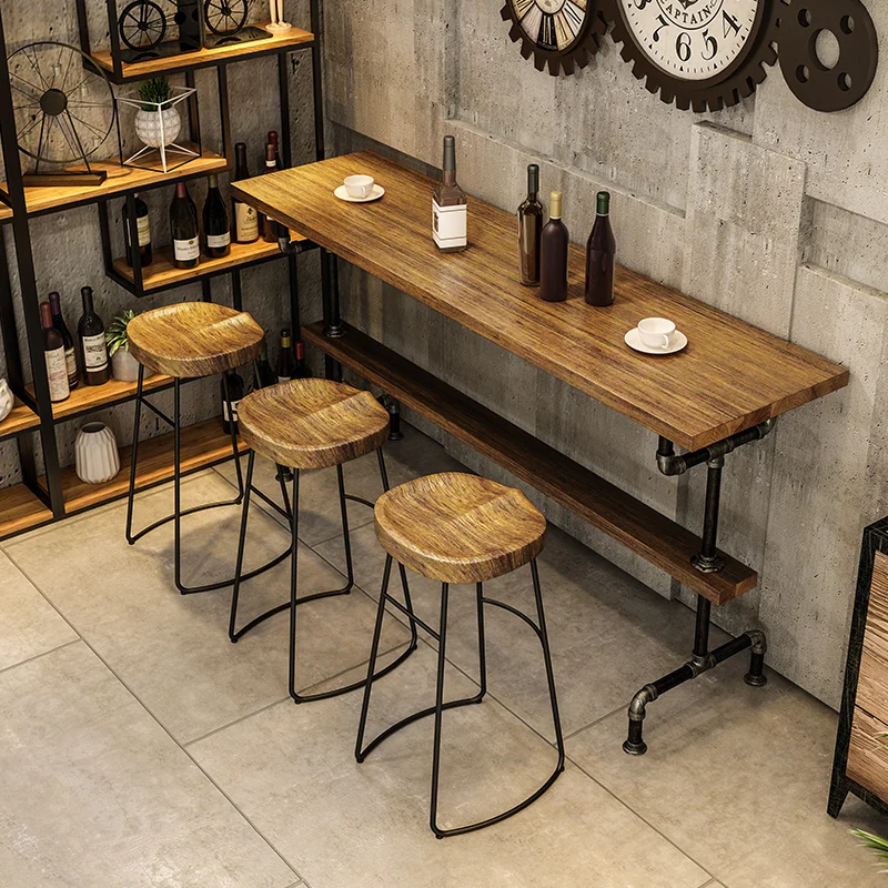 Industrial style retro water pipes, iron art solid wood bar tables and chairs, milk tea shop bars, high legged tables and chairs