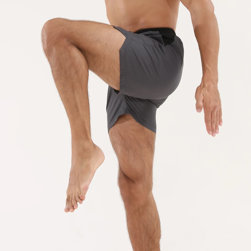 Celana pendek kasual olahraga Crazy Muscle untuk pria, latihan kebugaran, lari, gaya tipis satu lapis cepat kering musim panas, ukuran Eropa