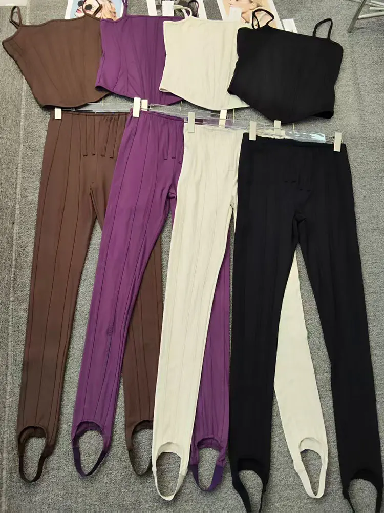 

In the summer of 2026, the new women's suit fishbone slim sling top+high waist, slim hips and leggings with a sense of design.