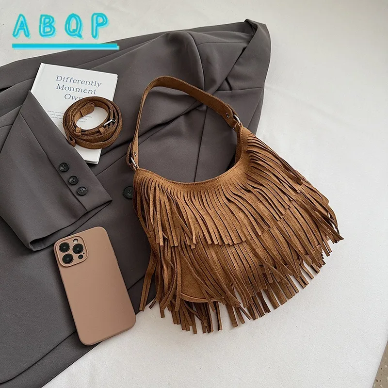 حقيبة كتف شرابة سعة كبيرة للنساء 2025 ريترو شعبية جديدة بسيطة حقيبة ساع حقيبة يد عصرية