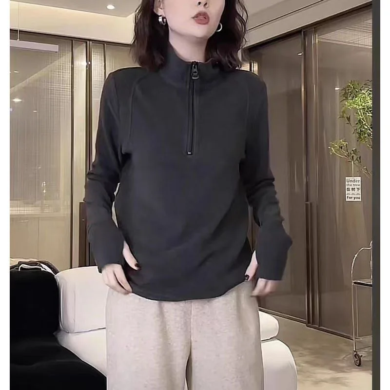 Semi-high-necked autumn and winter women's new stand-up collar sweater fashion Joker simple top.