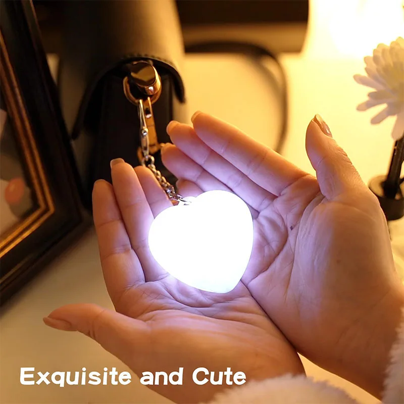Heart-shaped LED touch-sensitive keychain pendant as a gift bag light night light