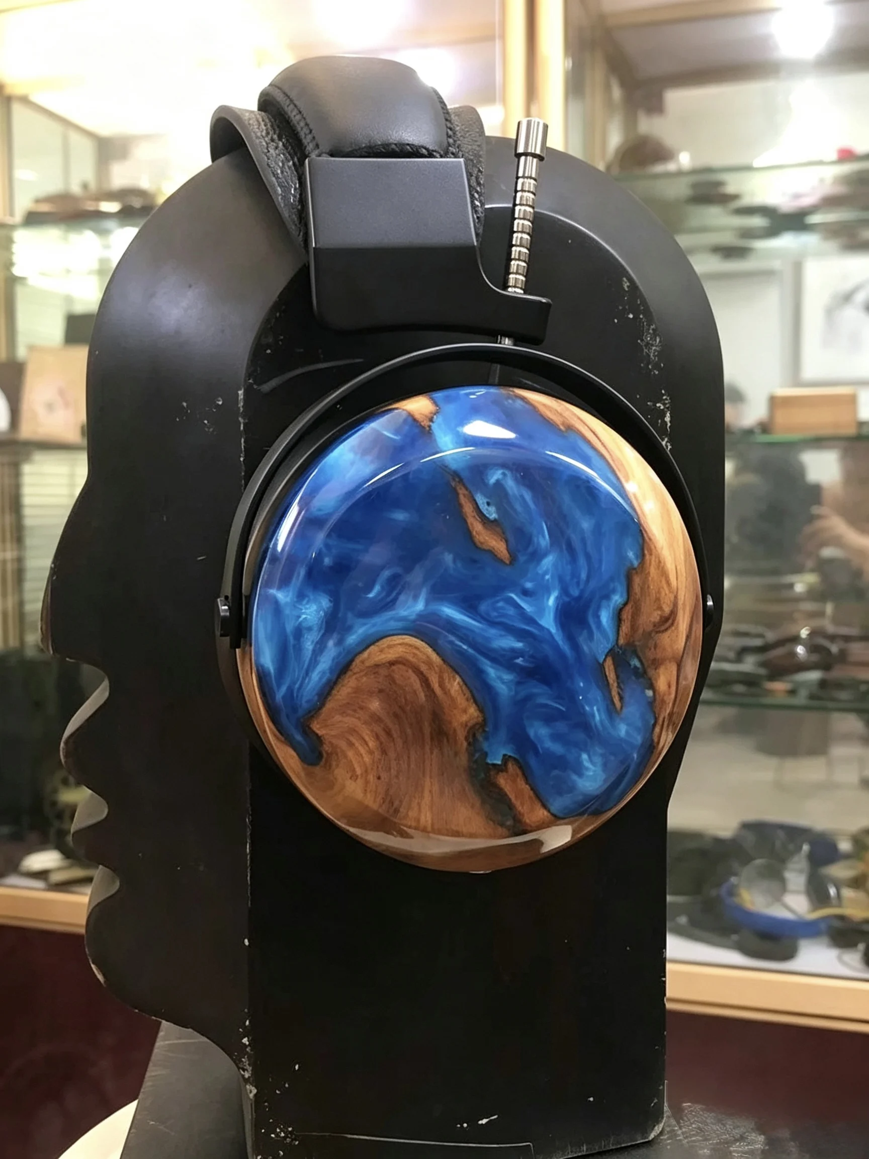 Closed-back headphones with solid wood construction, each piece featuring unique, vibrant, and beautiful grain patterns of high