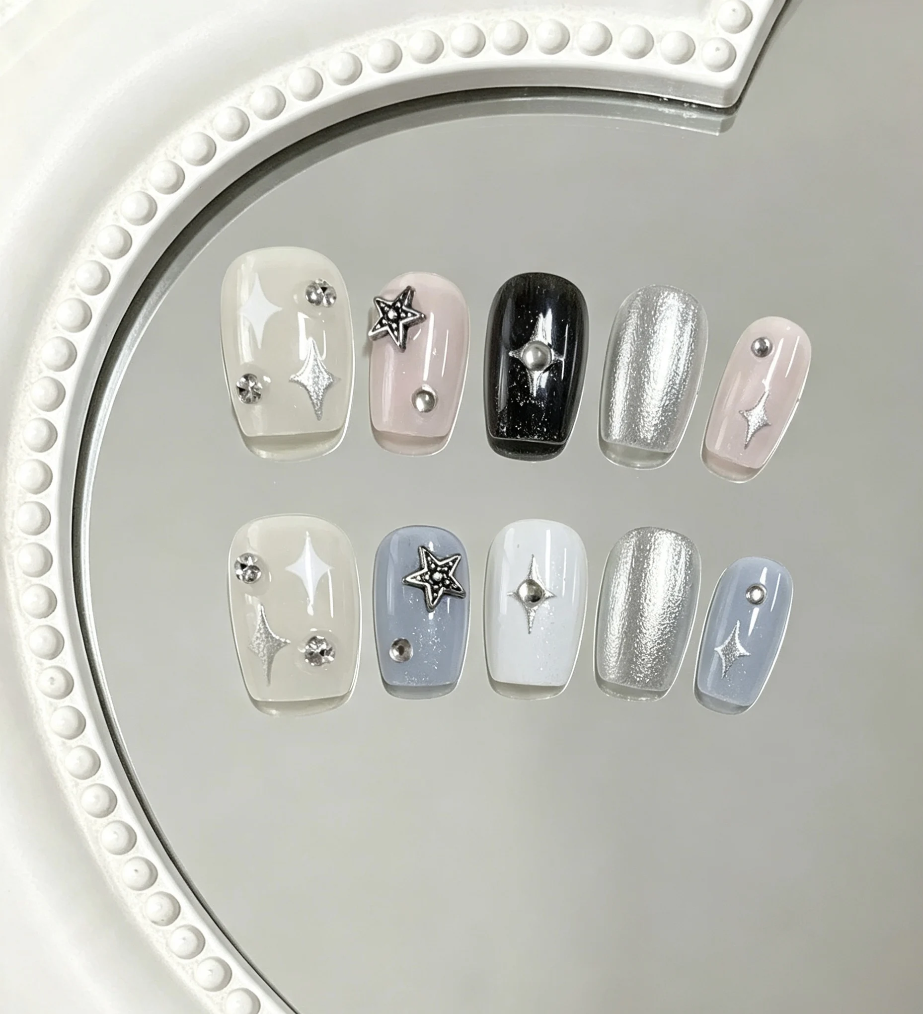 10-Piece Set of Cool-Toned Silver-Gray Metallic Starburst Press-On Nails