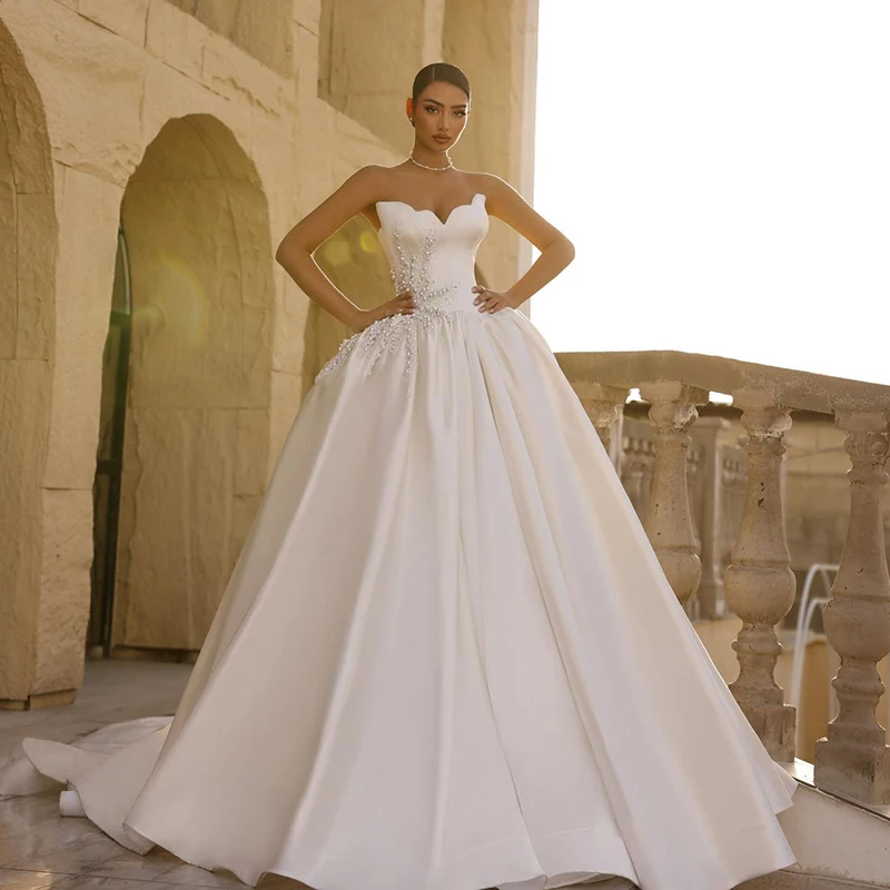 Robe de mariée trapèze pour femmes, tenue de mariée en cœur, sans manches, avec perles, robe de bal de mariage princesse, personnalisée, 2026