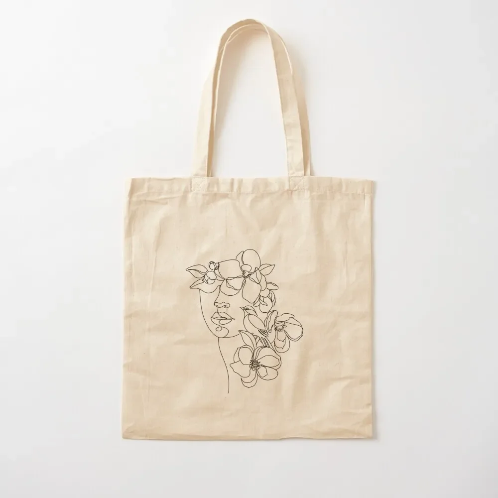 Abstract face with FLOWERS by one line drawing. Portrait minimalistic style. Botanical print. Nature symbol of cosmetic Tote Bag