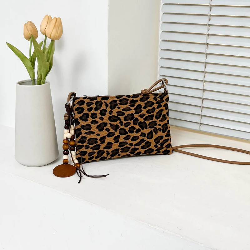 Leopard Print Crossbody Bag for Women Vintage Suede Small Shoulder Bag with Bead Pendant Casual Daily Mini Phone Purse